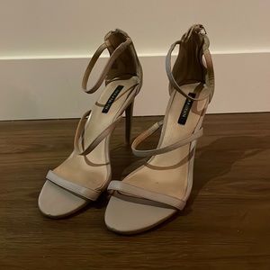 Nude leather strappy heels. Very sexy. Little zipper detail at back of heel